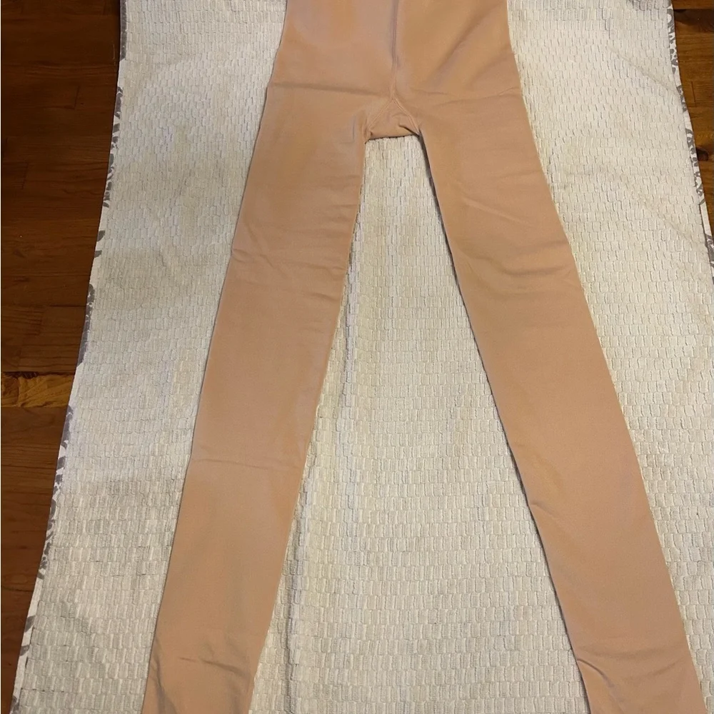 Source‎ Unknown Tan tights